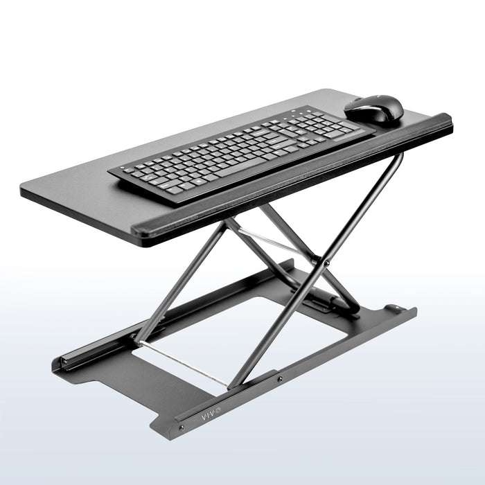 Sturdy height adjustable keyboard tray.