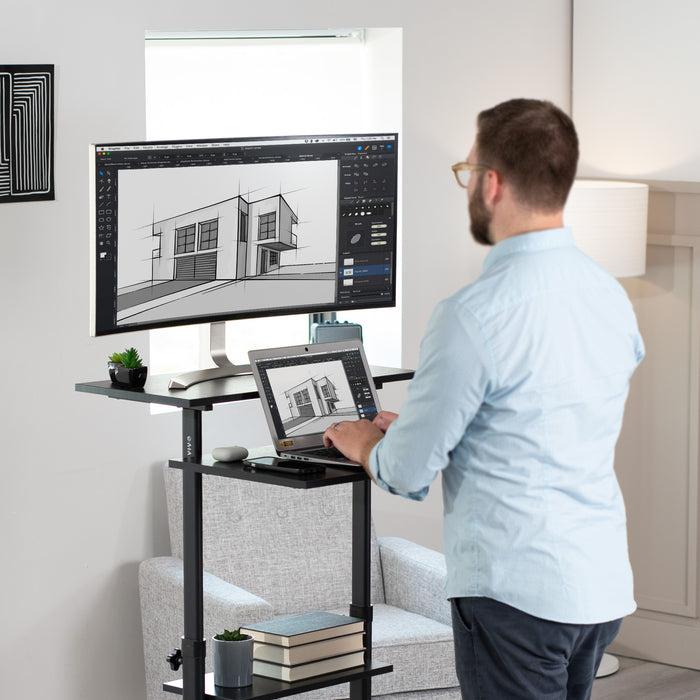 A height adjustable mobile stand-up desk that is perfect for use at the office, home, showroom, and classroom, and provides ample room for typing, writing, and storing.