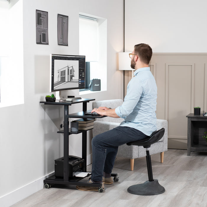 A height adjustable mobile stand-up desk that is perfect for use at the office, home, showroom, and classroom, and provides ample room for typing, writing, and storing.