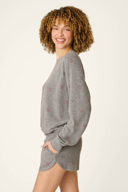 Red, White, & Woof Star Print Long Sleeve Top