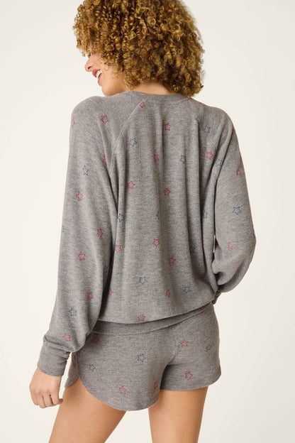 Red, White, & Woof Star Print Long Sleeve Top