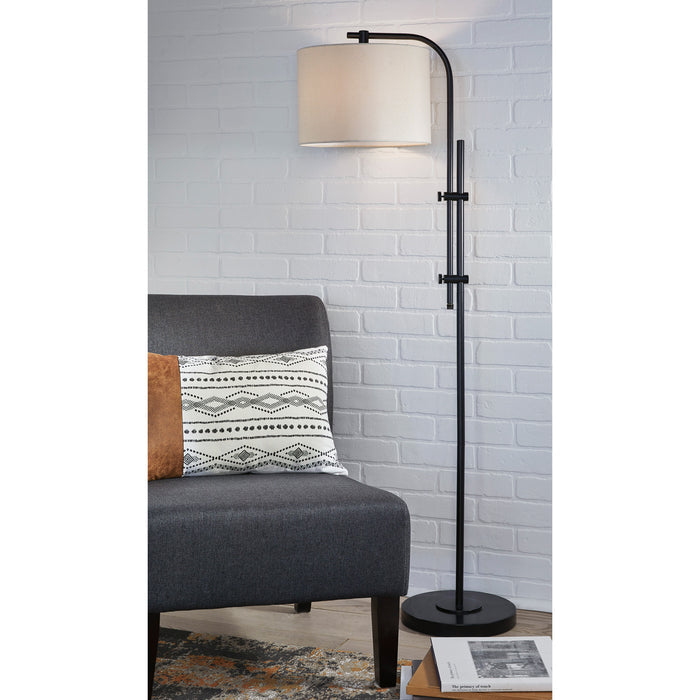 A room setting featuring Baronvale Black Floor Lamp