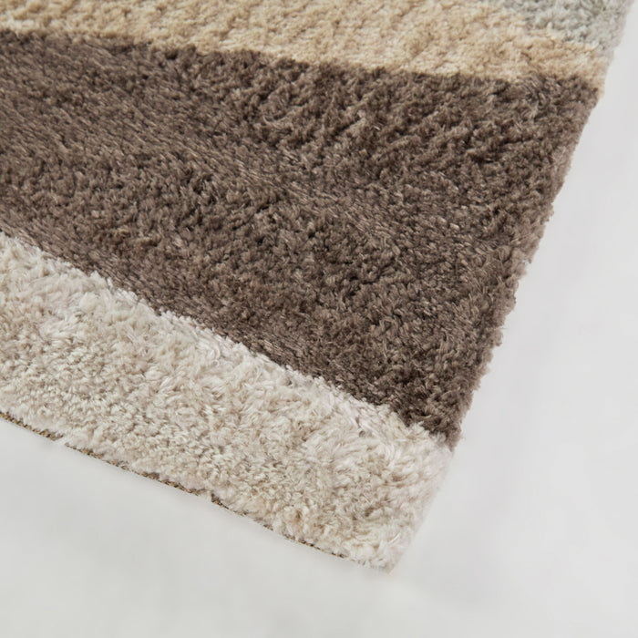 Front right view of Brennan Cream 5x8 Geometric Area Rug