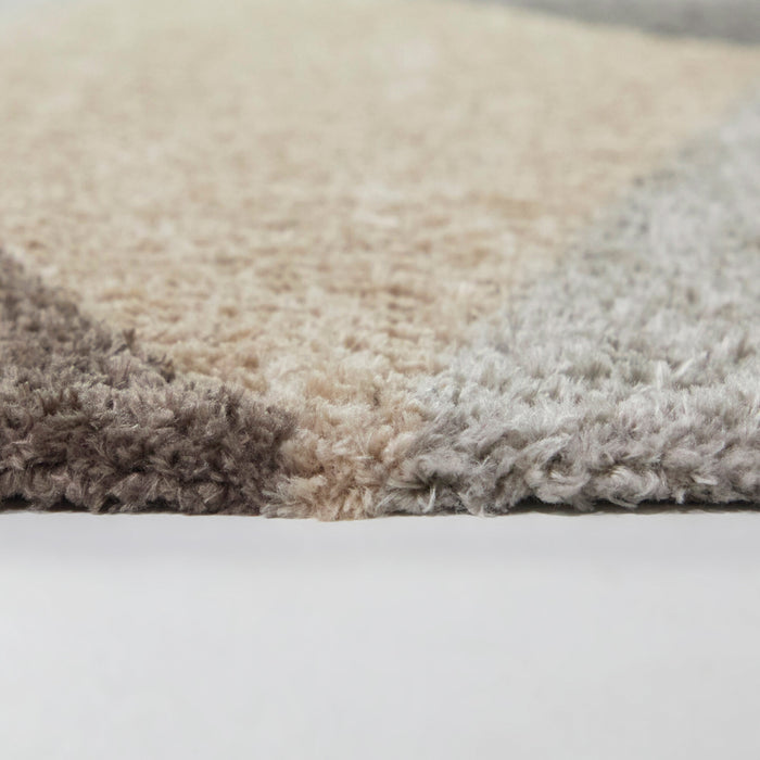 Side view of Brennan Cream 5x8 Geometric Area Rug