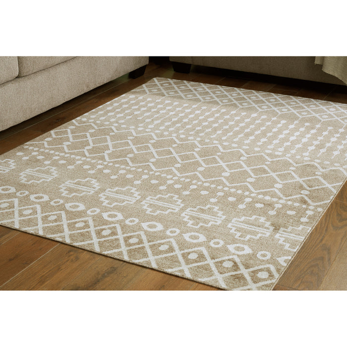 A room setting featuring Bunchly Washable Tan 5x8 Rug