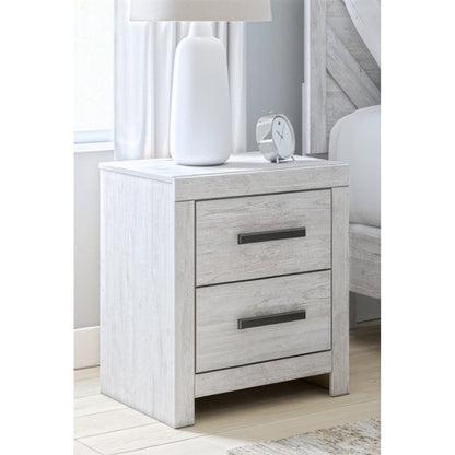 A room setting featuring Cayboni White Nightstand