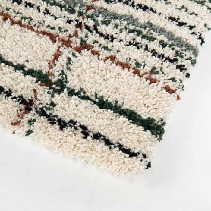 Front right view of Circe Cream 5x8 Shag Area Rug