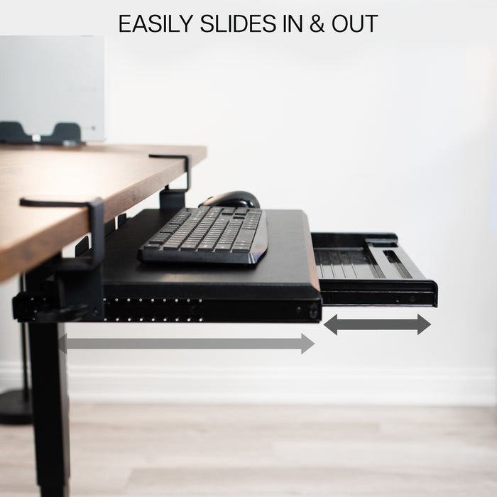 Clamp-on keyboard tray with pencil drawer for convenient space-saving desk workstation.