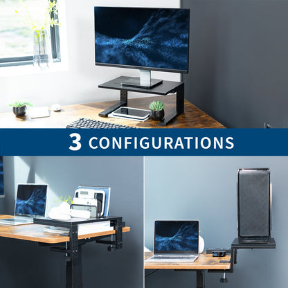 Multi-functional desk setup with monitor, laptop, and keyboard on a wooden surface.