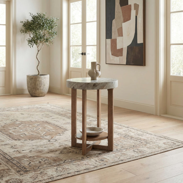 A room setting featuring Danby Alabaster Chairside Table
