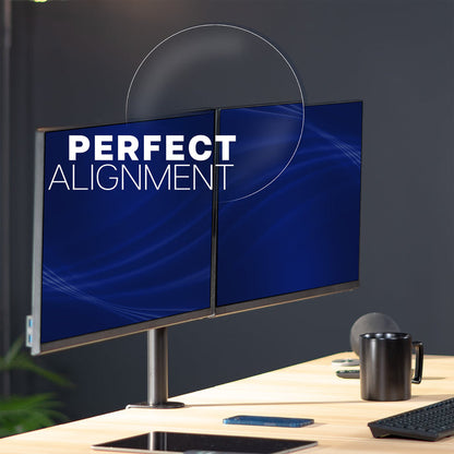 Two computer monitors on a desk with 'Perfect Alignment' text on the screen.