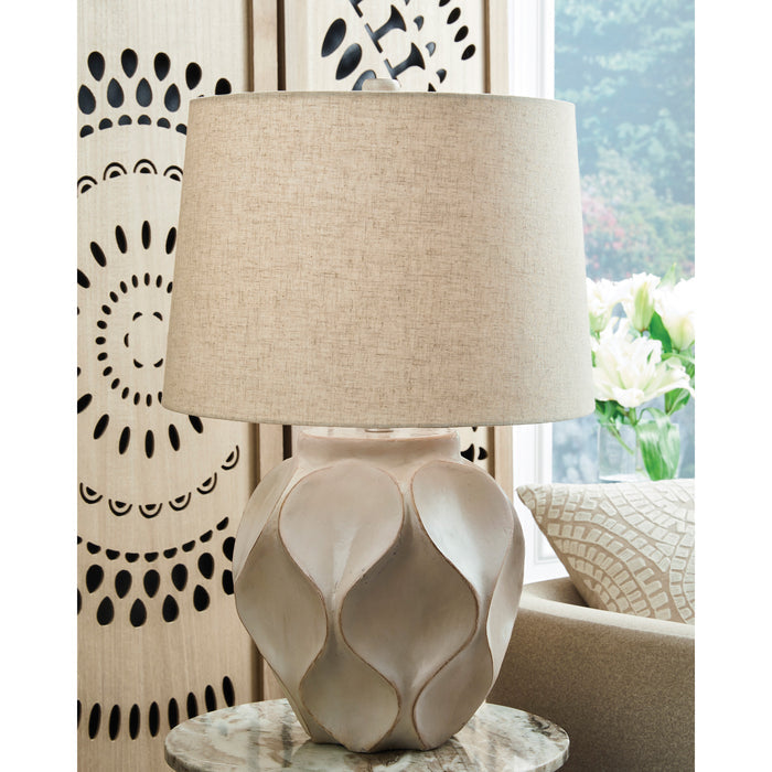 A room setting featuring Edselham Distressed Cream Table Lamp