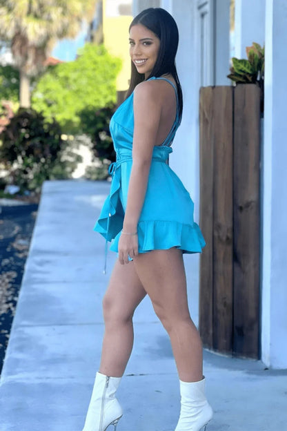 Fade Into You Turquoise Romper with Ruffle Hem and Wrap Design