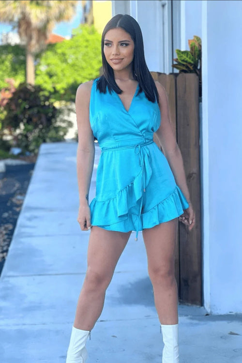 Fade Into You Turquoise Romper with Ruffle Hem and Wrap Design