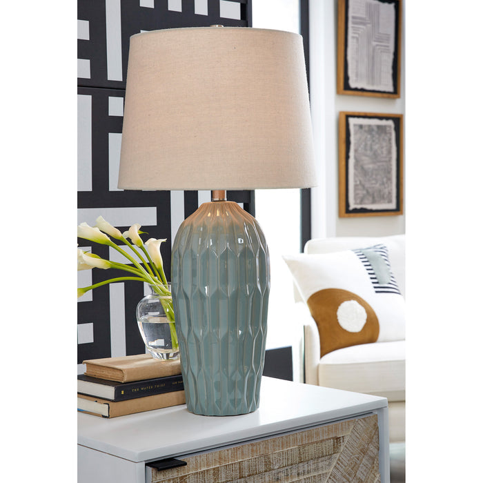 A room setting featuring Hadbury Blue Set of 2 Table Lamps