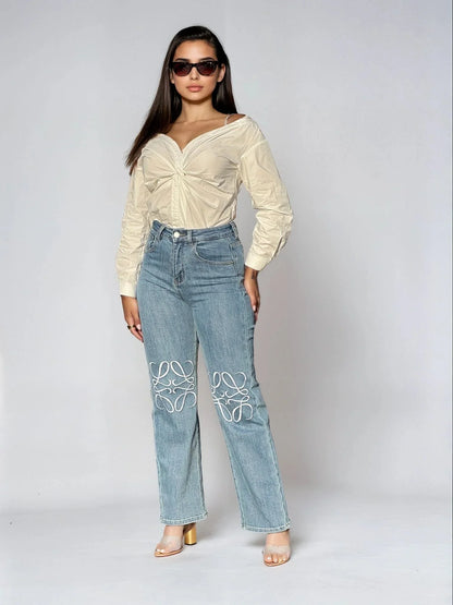 High-Rise Straight Leg Jeans with Embroidered Knee Detail