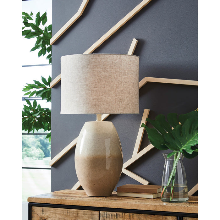 A room setting featuring Linas Beige Table Lamp
