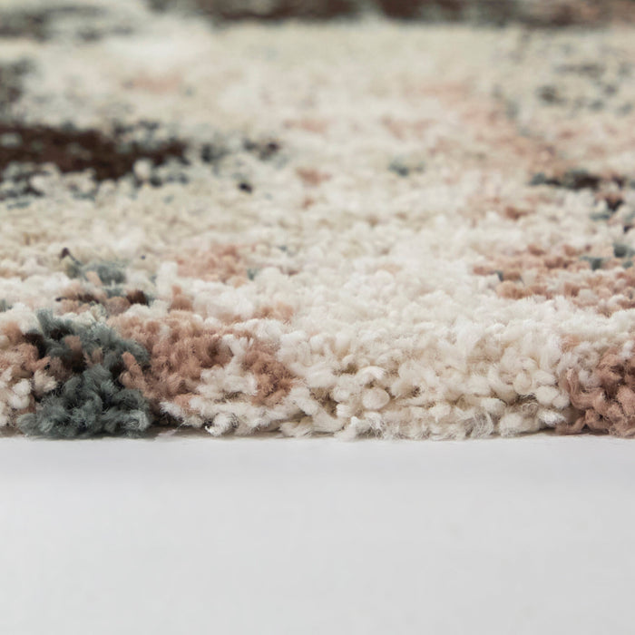 Side view of Macleod Cream 5x8 Abstract Area Rug