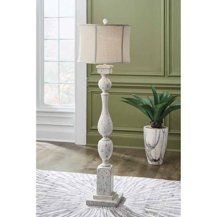 A room setting featuring Madsbrook Antique White Floor Lamp