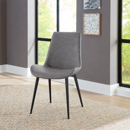 A room setting featuring Nicoya Steel Gray Dining Chair