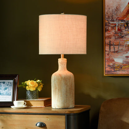 A room setting featuring Olney Greige Table Lamp