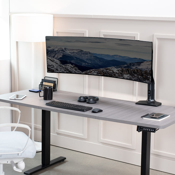 Sturdy adjustable pneumatic arm single ultrawide monitor ergonomic desk mount with USB ports for office workstation.