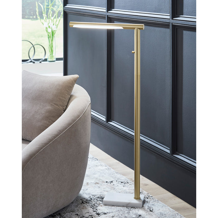 A room setting featuring Floor Lamps (40"+) Gold Santiford Floor Lamp