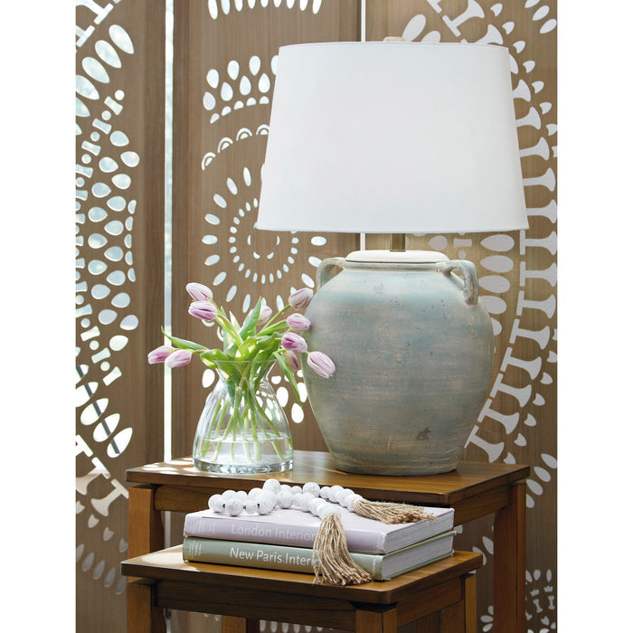 A room setting featuring Shawburg Blue Table Lamp