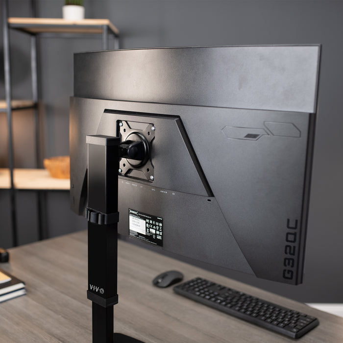 Sturdy adjustable single monitor ergonomic desk stand for office workstation.