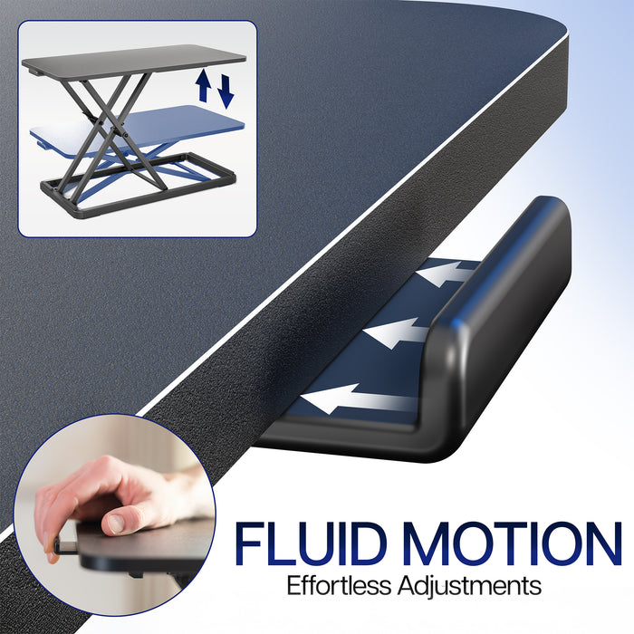 Adjustable desk stand with fluid motion feature and hand holding handle inset.