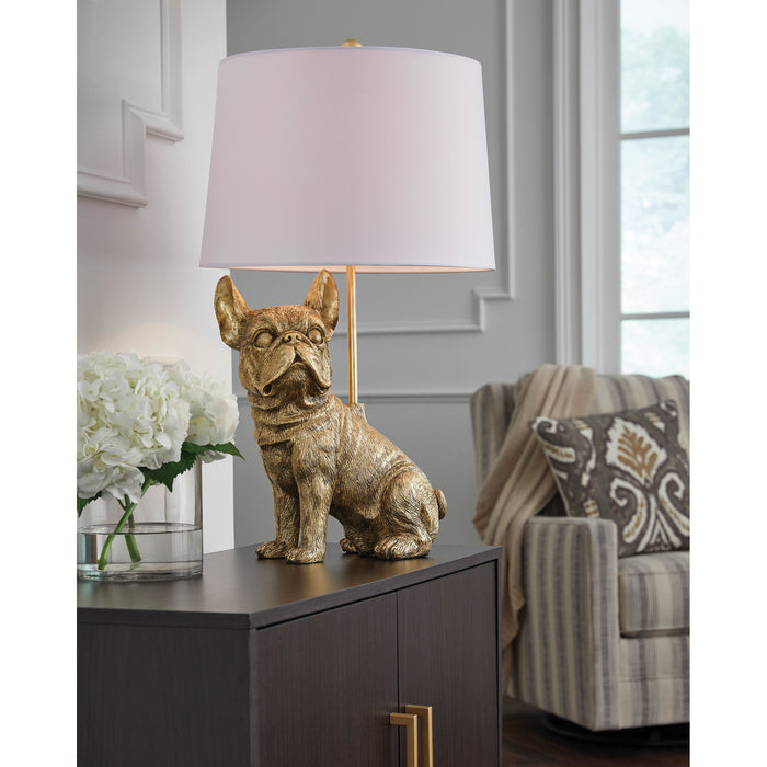 A room setting featuring Wadeland Gold Table Lamp
